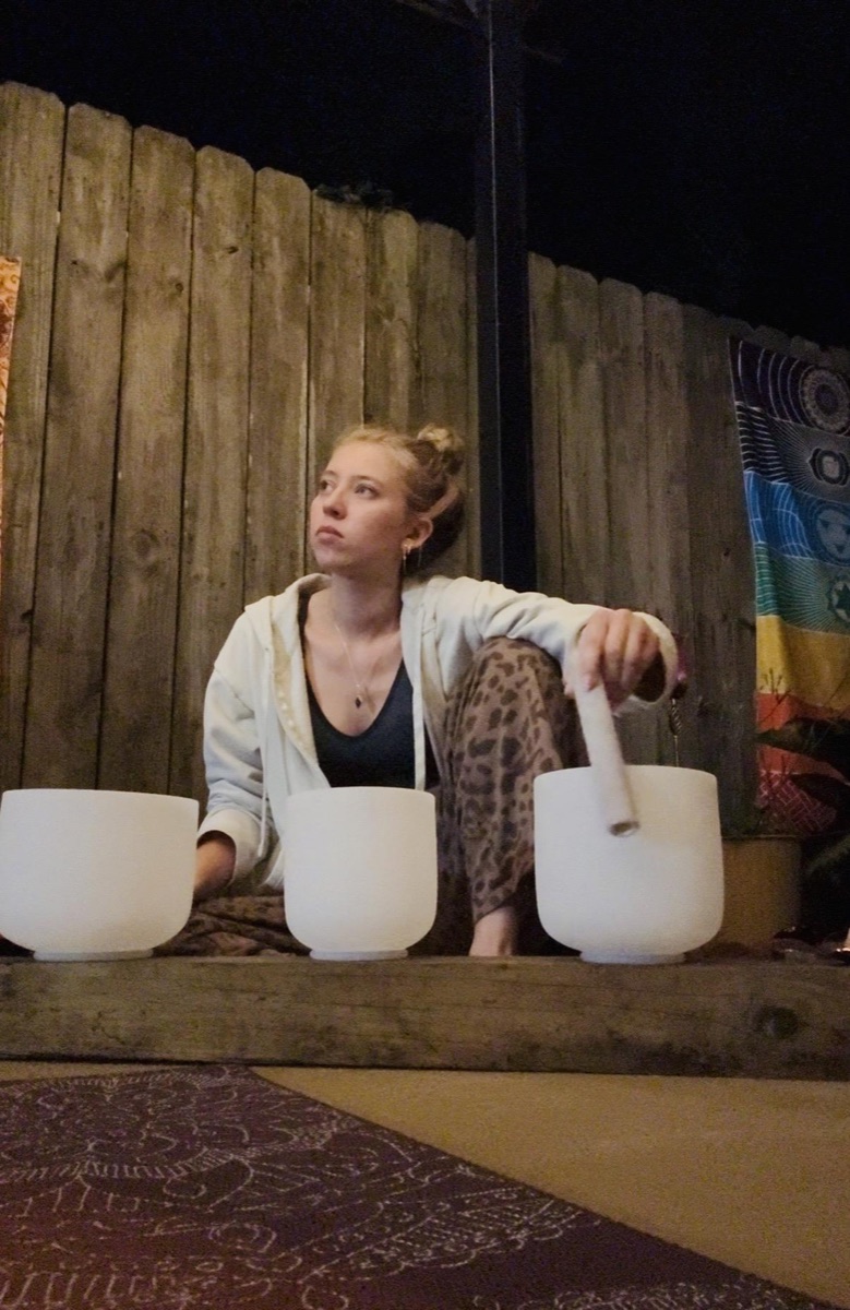 Crystal singing bowls set up for a sound therapy session